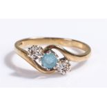 9 carat gold ring, with a central blue stone flanked by star mounts, 2.2 grams