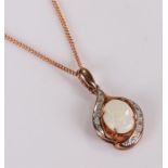 9 carat gold opal pendant necklace, with 9 carat gold chain, the pendant 13mm diameter