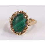 9 carat gold malachite ring, set with an oval malachite head