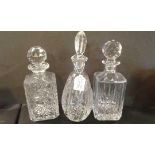 Three cut glass decanters, (3)