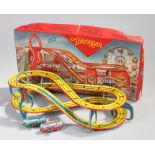 West Germany tinplate toy, with a track in yellow with two clock work buses