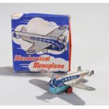 Mettoy tinplate clockwork monoplane, with red and blue to the body, boxed
