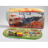 Magic Shunting Train tinplate toy, made in Great Britain, tinplate railway Goods Depot scene,