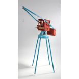 Tri-ang Crane, of large size, with a red cab and blue supports, 92cm high