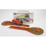 Mettoy tin plate train toy, the red locomotive with a four piece track