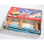 Chad Valley tinplate clockwork toy, Overhead Railway, with a cream clockwork car, blue track and red