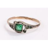 9 carat gold ring, with a green stone set in a silver head, ring size O