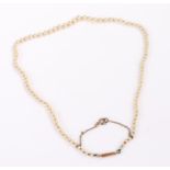 9 carat gold and pearl necklace, with a 9 carat gold clasp with a row of pearls, 41cm long