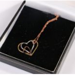 9 carat gold pendant necklace, with a three heart pendant, 1.9 grams