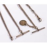 Two silver pocket watch chains, 32cm long and 36cm long, (2)