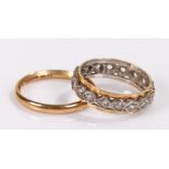 9 carat gold rings, to include an eternity ring and a wedding band, total weight 5 grams