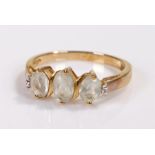 9 carat gold ring, set with three pale blue stones, ring size Q