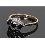 18 carat gold sapphire and diamond set ring, the head set with three sapphires and diamond to the