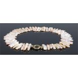 Mother of pearl necklace, with a row of rectangular links with a 14 carat gold clasp end, 47cm long