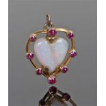 Opal and ruby heart pendant, the central opal carved as a heart with round cut ruby surround, 14mm