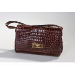 Early 20th Century crocodile leather handbag, with gilt metal catch, 27cm wide