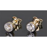 Pair of diamond stud earrings, each round cut diamond at approximately 4.6mm