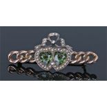 9 carat gold pearl set dual heart brooch, the hearts to the centre with green stones and pearl