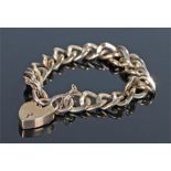 9 carat gold bracelet, the links leading to the padlock clasp, 40 grams