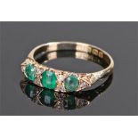 18 carat gold emerald and diamond set ring, the head with three emeralds and six diamonds, ring size