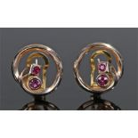 Pair of 9 carat gold earrings, set with red stones, 21mm high, 7.5 grams