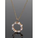 18 carat gold pearl and diamond pendant necklace, the pendant of circular form set with pearls and