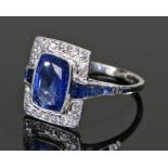 Fine Ceylon sapphire and diamond set ring the central sapphire at 4.11 carat and no indications of