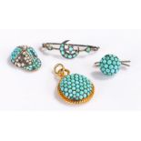 Turquoise set jewellery, to include a jockey cap, a crescent brooch, a button and a pendant, (4)