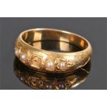 18 carat gold pearl set ring, set with four pearls, ring size O