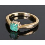 18 carat gold emerald ring, the square cut emerald with claw mounts, ring size M