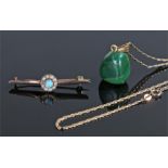 9 carat gold and malachite pendant, the malachite pendant with an attached 9 carat gold chain,