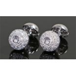 Chopard, a pair of diamond set 18 carat white gold cufflinks, the ball end set with diamonds to