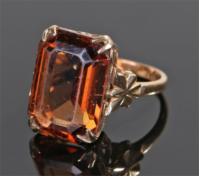 9 carat gold smoky quartz ring, the emerald cut smoky quartz with a four claw mount, ring size O