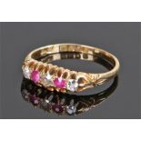 18 carat gold ruby and diamond set ring, the head set with three diamonds and two rubies, ring