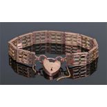 9 carat gold gate bracelet, with gate links and padlock clasp, 23 grams