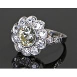 Impressive platinum and diamond set ring, the central diamond at 2.68 carats with a diamond