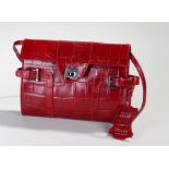 Oriano crocodile leather effect handbag, in red with chrome fittings, label to the interior, 22.