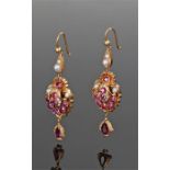 Pair of pearl and garnet earrings, with an arch of garnets terminating with pearls with a garnet