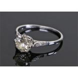 Platinum diamond set solitaire ring, the central diamond at approximately 1.65 carat flanked by