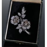 Late 19th Century diamond set brooch, of large proportions, the diamond set flowers and leaves