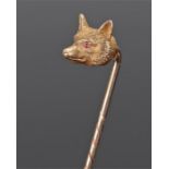 Yellow metal fox head stick pin, the head set with rubies to the eyes, 70mm high