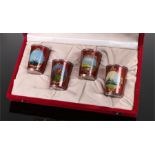 Set of four, Russian silver, vodka beakers, each in red enamel with a scenes painted to each, 50mm