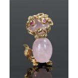 18 carat gold rose quartz and ruby dog brooch, with ruby eyes and a rose quartz body set within a