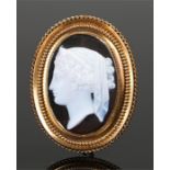 Victorian cameo brooch, carved with a classical lady facing left, within a yellow metal mount,