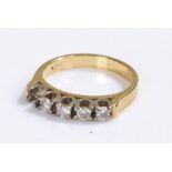 18 carat gold diamond set ring, with a row of round cut diamonds, one missing, 3.1 grams