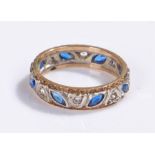 9 carat gold white and yellow gold eternity ring, set with sapphires and cubic zirconia, ring size O