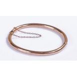 9 carat gold bangle, of tube design, 8.3 grams