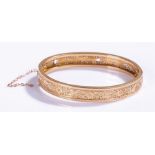 Gold bangle, with pierced foliate decoration, AF, 11.7 grams