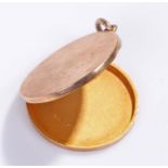 9 carat gold pendant locket, the circular case with loop top, 7.8 grams