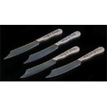 Set of four early 20th Century Japanese Shibayama caviar knives, decorated with foliate swags to the